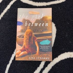 The Girl Between by Lisa Stromme